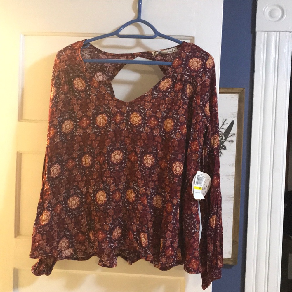 Brand new floral long sleeve top!